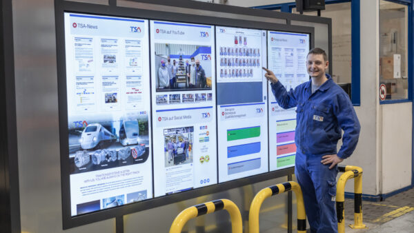 traktionssysteme-austria-interaktives-mitarbeiter-info-system-produktion-600x338